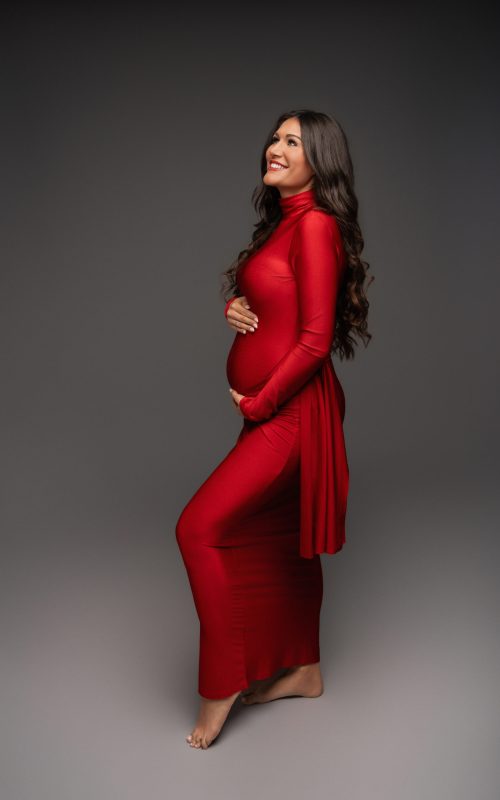 Babybauchshooting rotes Kleid
