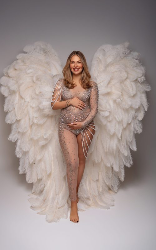 Babybauchshooting mit Flügel